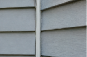 Close-up of vinyl siding panels showing seams and surface texture